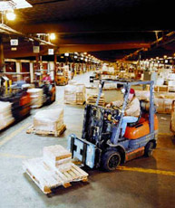 Unloading Services - Forklift moving pallets